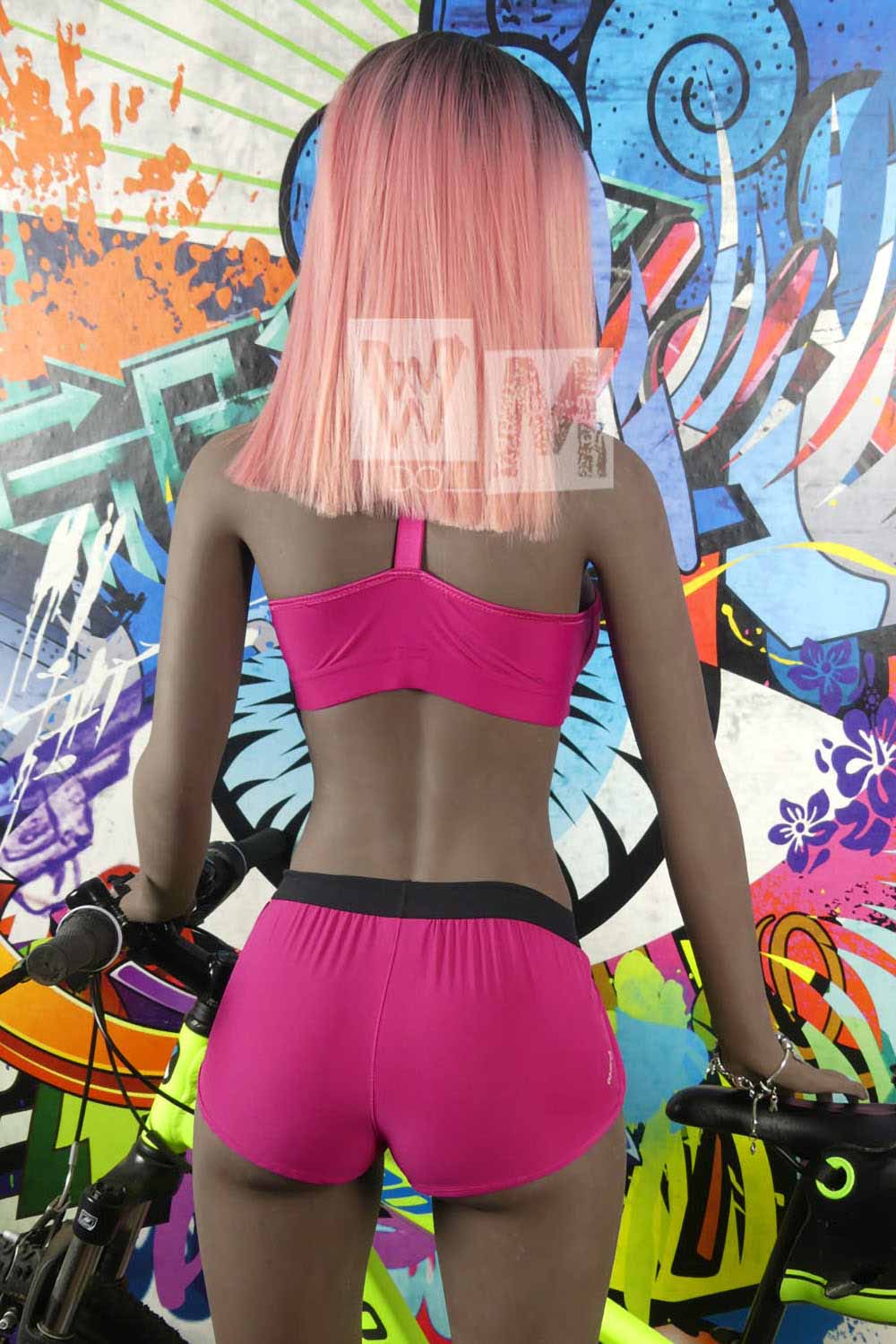 Undine sex doll with pink hair on display